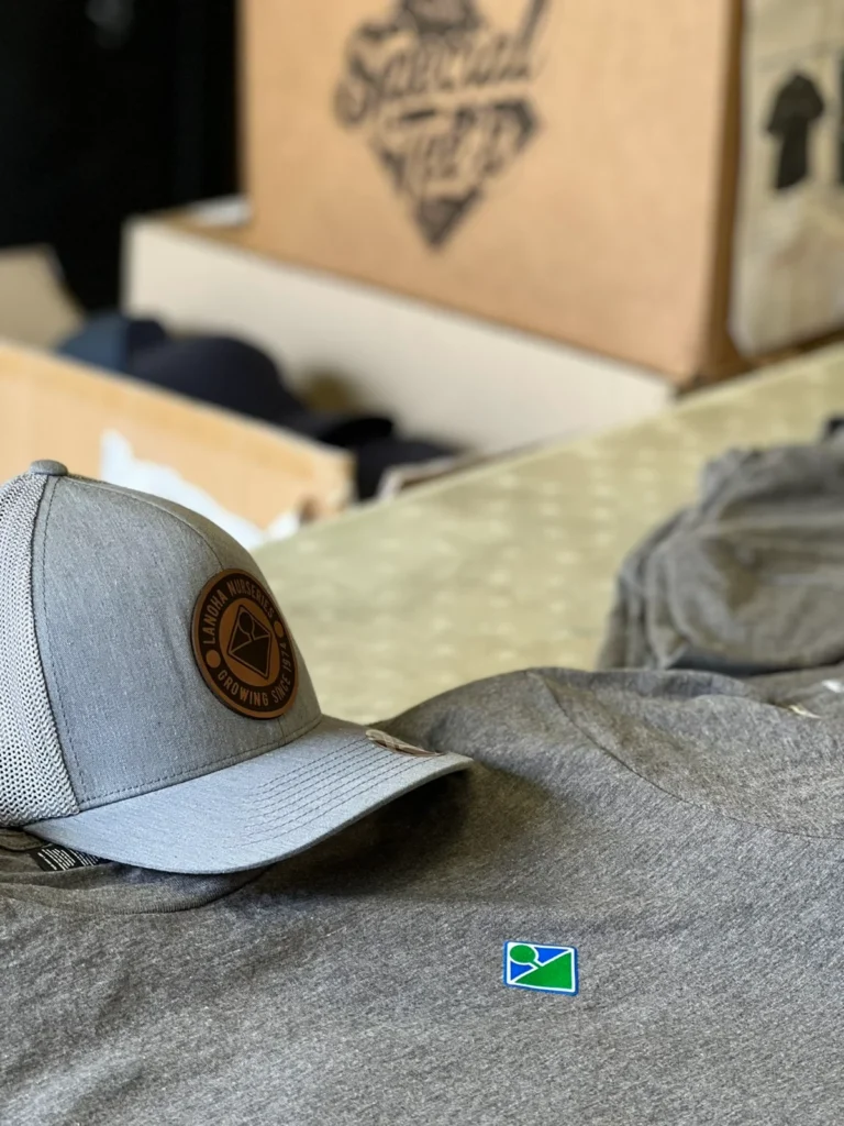 Gray hat with a leather patch and a gray t-shirt